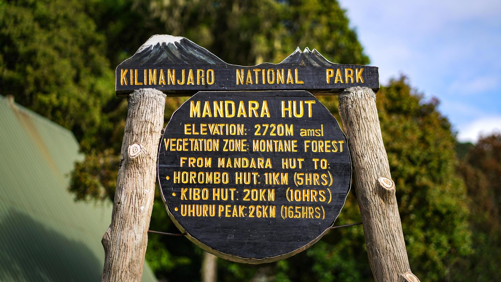 Mandara Hut sign in the Marangu source